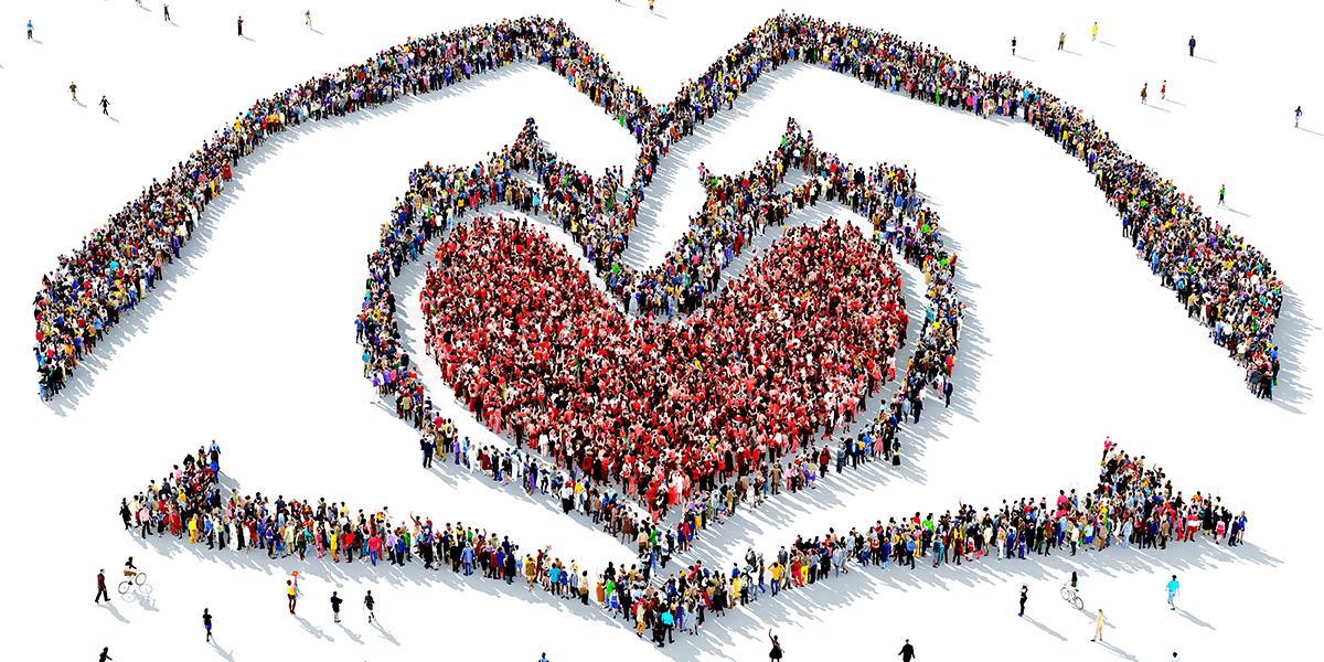 Group of people making love symbol